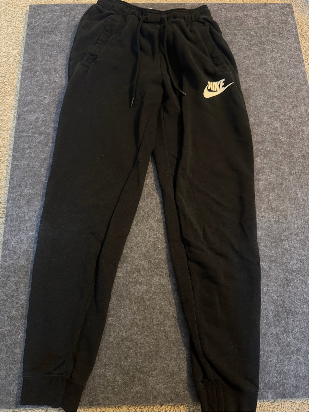 Nike Black Jogger Sweatpants with White Swoosh Logo